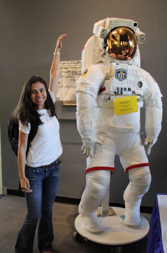 Giselle showing a space suit